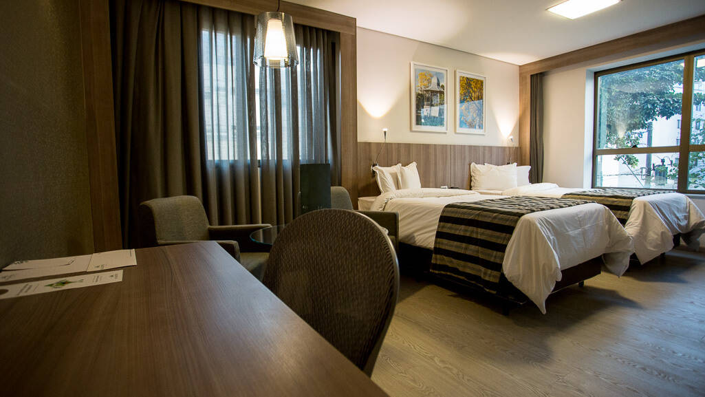 e.suites sion, em BH